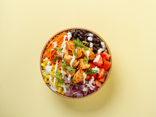 brown rice, cajun chicken, tomato, corn, black beans, carrots, onion, cilantro, and greek yogurt ranch dressing