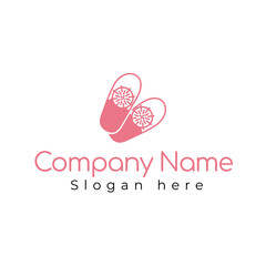 logo with an icon in the shape of slippers suitable for home textile or cozy hotel