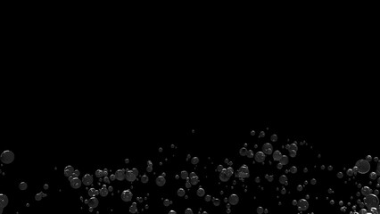 Soda bubbles floated up on the black background.
