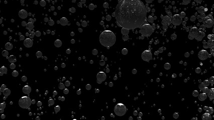 Soda bubbles floated up on the black background.