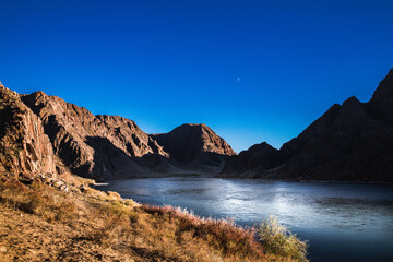 Fototapeta na wymiar Suset rocky picturesque landscape with the Ili river in the Almaty region of Qazaqstan.