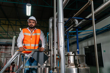 Fototapeta premium Factory engineer checking the system inside the industrial plant