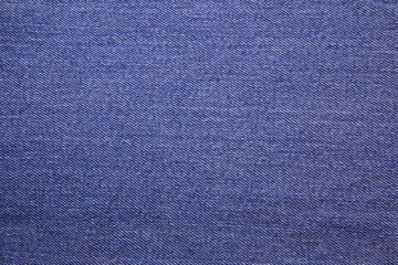 Blue jeans fabric background texture. Blue jeans fabric cloth textile material.