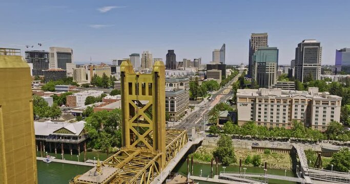Sacramento City California Aerial v16 low fly around historic art deco tower bridge capturing downtown cityscape of the old town and waterfront ziggurat buildings - Shot with Mavic 3 Cine - June 2022