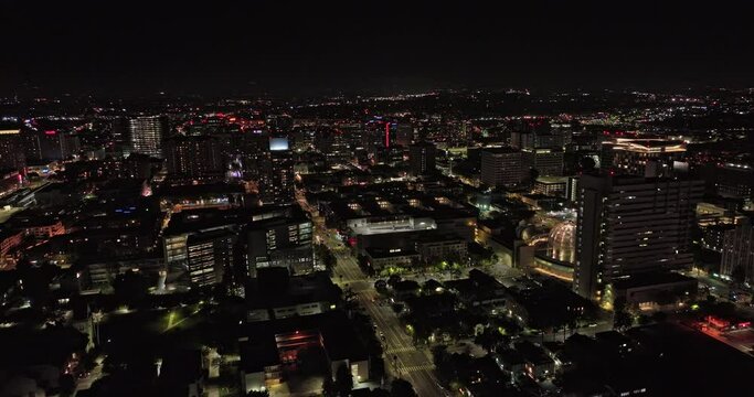 San Jose California Aerial v3 cinematic drone flyover and around downtown capturing illuminated cityscape, state university campus area and city hall at night - Shot with Mavic 3 Cine - June 2022