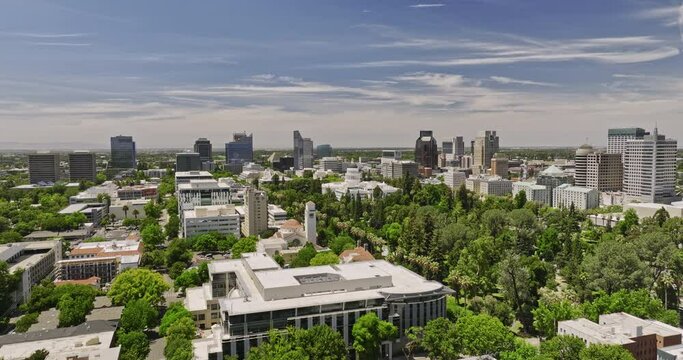 Sacramento City California Aerial v1 cinematic low flyover across downtown capturing urban cityscape and landmark state capitol building and riverside landscape - Shot with Mavic 3 Cine - June 2022
