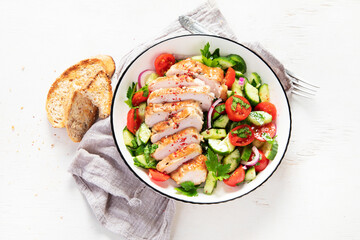 Salad with chicken meat. Fresh vegetable salad with chicken breast. Meat salad with chicken fillet...