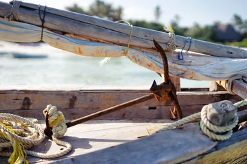 Crédence de cuisine en verre imprimé Plage de Nungwi, Tanzanie Traditional boat on beautiful beach and tropical sea at low tide in Jambiani, Zanzibar, Tanzania Africa
