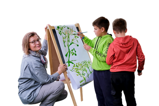 Mother teaches to paint with two boys pupils, isolated on a white background. Woman teacher artist paints with children on paper nature and trees by the river - Powered by Adobe