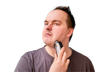 Portrait of disheveled adult man shaving stubble with electric razor, isolated on a white background