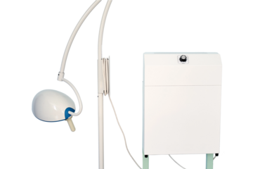 An air purifier and a lamp for lighting during operations and medical procedures in the hospital, isolated on a white background