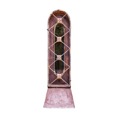 The window of a vintage church in the Old Russian style with patterned wrought iron bars, isolated...