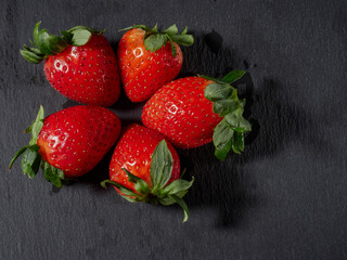 trawberries isolated on black background