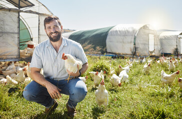 Man on farm, chicken and agriculture with smile in portrait, poultry livestock with sustainability...