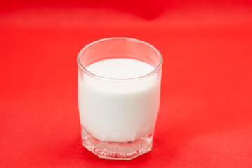 Glass of milk Isolated on a color background. Dairy product close-up. Drink milk for a good health. Cow milk. good product of social. copy space for text.