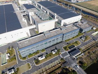Fototapeta premium solar panels on factory rooftop