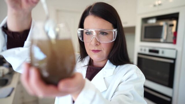 Soil test, female agricultural scientist conducting a soil test in a scientific lab in. soil agricultural agronomist in australia, soil microbial test in a scientific lab. Soil microbes