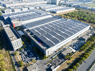 Fototapeta premium solar panels on factory rooftop