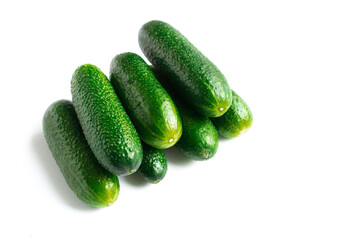 green fresh cucumbers isolated on white background