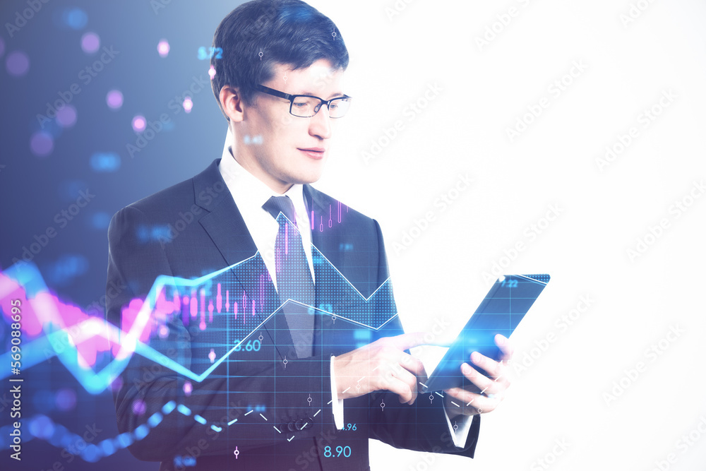 Poster trade, finance and market concept. side view of attractive young caucasian man in eyeglasses using t