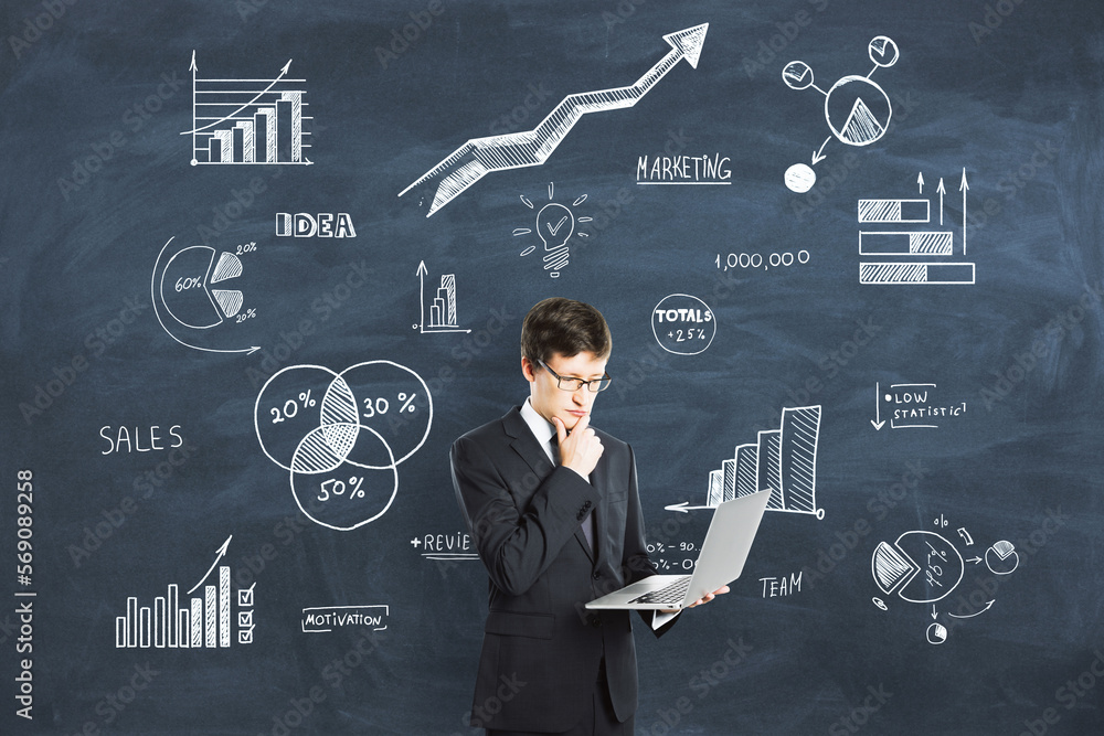 Poster investing, analysis and brainstorming concept with businessman using modern laptop on blackboard bac