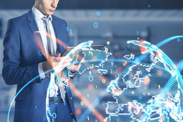 businessman hands using tablet with abstract globe sphere hologram with coding and polygonal network on blurry office interior background. Future, technology and digital world concept.