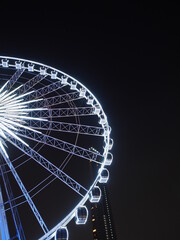 BANGKOK - February 5: Night scene of the Large Ferris wheel in Asiatique, open outdoor community shopping mall in Bangkok, Thailand, under dark night sky, on February 5, 2023.