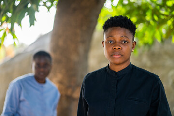 Two queer masculine black women at the park