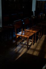 chair in dark room with spot light