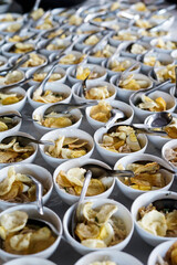 soto ayam is authentic indonesian food. lined up on the dining table ready to be served