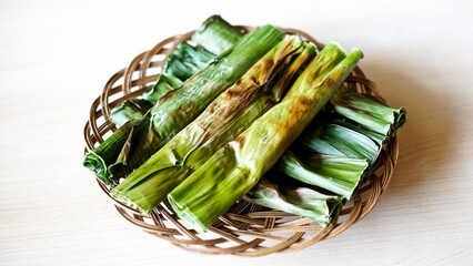 Indonesian traditional food is called otak otak. food made from minced mackerel wrapped in banana...