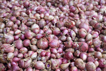 Red onion in a stall in Ciwidey traditional market in Bandung, Indonesia.