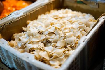 Dried crackers are sold per kilogram in traditional markets