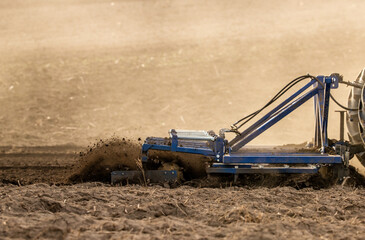 The promise of spring, tractor readying the fields for a new season of growth