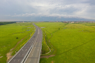 Aerial view of A3 Highway motorway road cross with city ring road (Centura Bucuresti DNBC in Romanian language) from Bucharest, Romania
