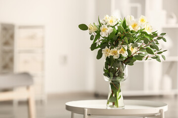Bouquet of alstroemeria flowers on table, closeup