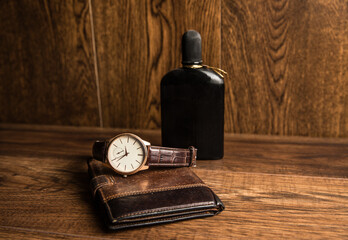 Leather wallet, perfume and watch