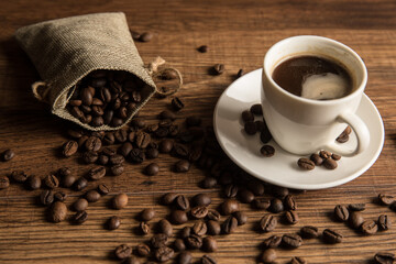Cup of coffee and coffee beans