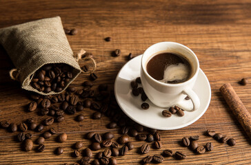 Cup of coffee and coffee beans