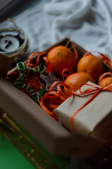 tangerines in a gift box and gifts