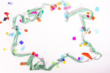 Rectangular Colorful green paper ribbon and confetti frame carnaval festival on white background