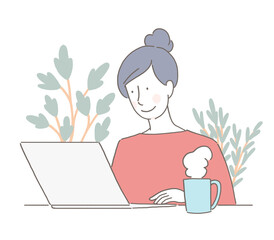 ノートパソコンを見る女性