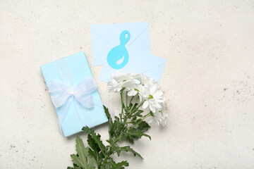 Envelopes, number 8, chrysanthemum flowers and gift for Women's Day celebration on white background