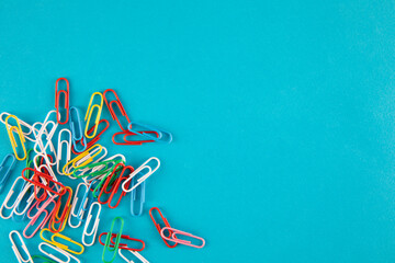 Paperclips on Blue Background