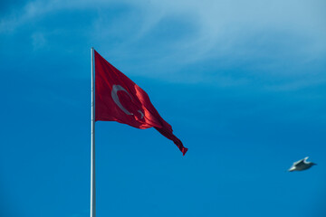 Turkish flag waving in sky
