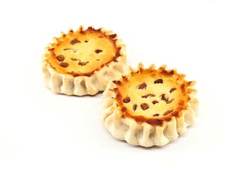 Pardulas or Formaggelle on  white background. It is a typical Sardinian Easter cake made with ricotta or cheese. 