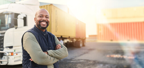 Man, portrait and arms crossed by truck, container stack and happy for transport job. Driver, smile and shipping cargo freight with happiness in transportation service, stock delivery or supply chain © Chanel M/peopleimages.com