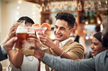 Friends, cheers and diversity in celebration in restaurant, party and happiness together for valentines day. Love, friendship and toast, happy hour social event, people smile at pub for drinks date.