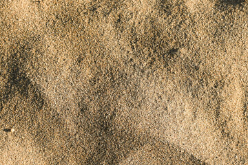 Fondo abstracto con textura suavizada y degradado de tonos marrones con textura de arena