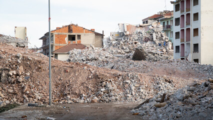 Earthquake damage in a city. Destroyed buildings after an earthquake. Collapsed buildings. Ruined...